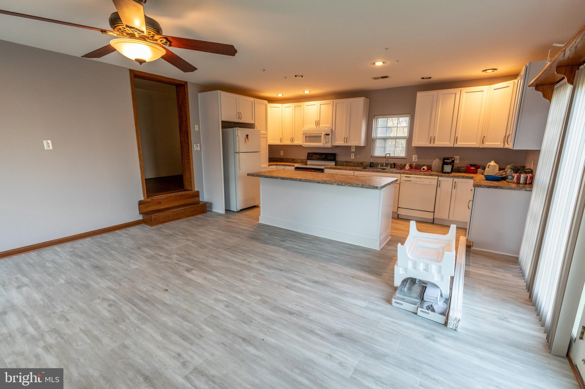 60 Policeman Club Road Falling Waters, WV 25419 - Photo 4 of 32 Kitchen and dining room are open