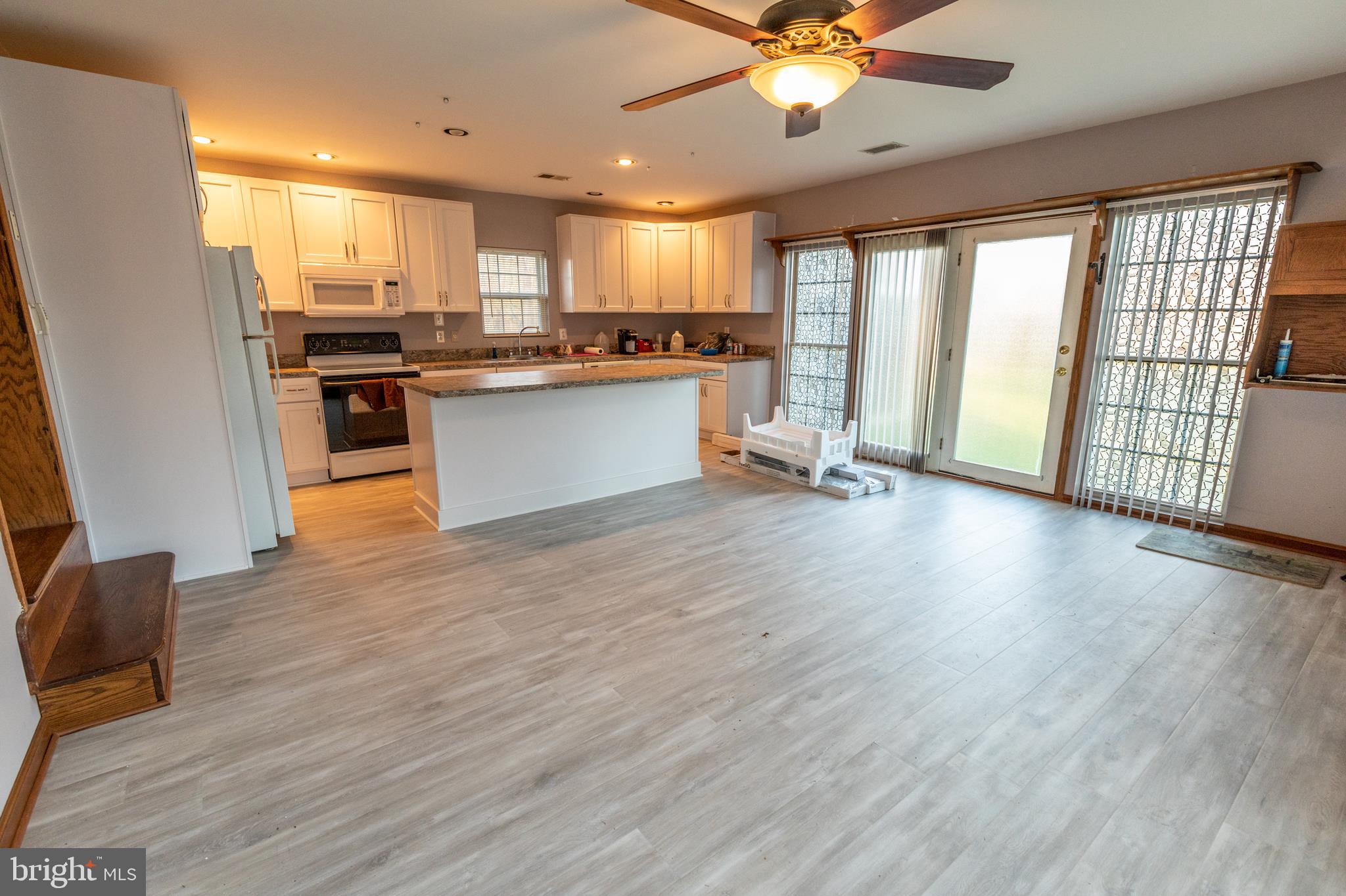 60 Policeman Club Road Falling Waters, WV 25419 - Photo 5 of 32 with updated floors throughout in great neutral