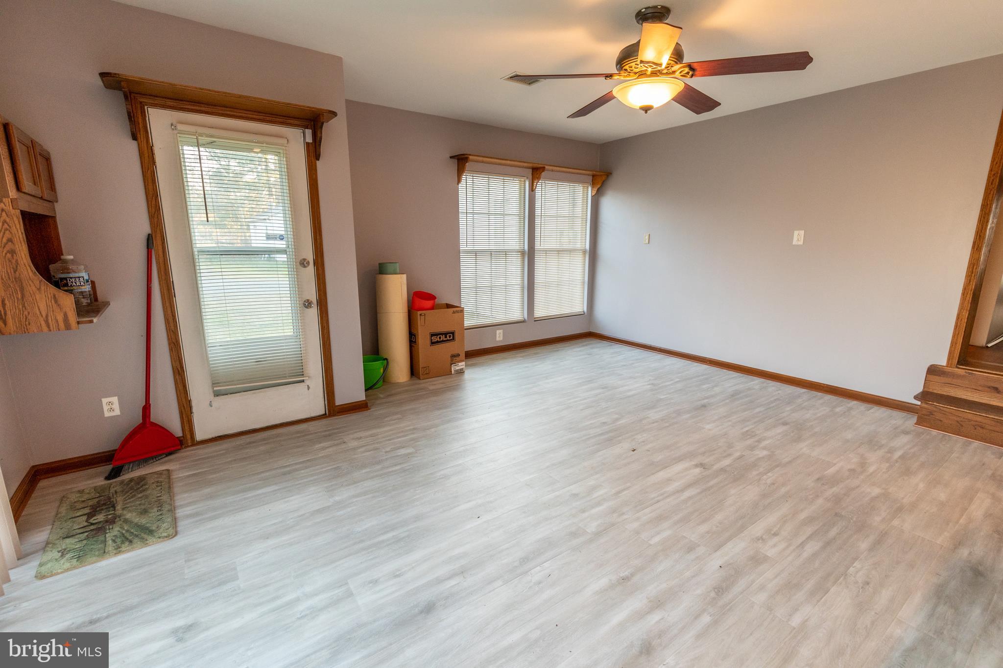 60 Policeman Club Road Falling Waters, WV 25419 - Photo 6 of 32 Features a ceiling fan and tons of natural light