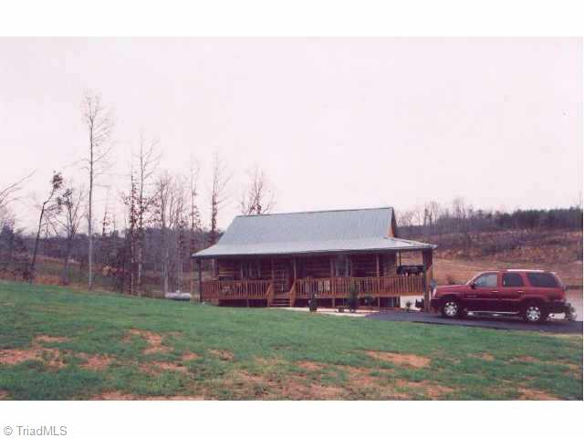 1055 Sunny Ridge Road Walnut Cove, NC 27052 - Photo 3 of 3 Other. Log home on lake.