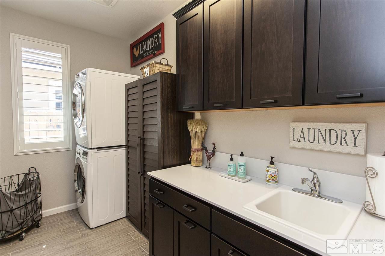 2190 Arpagos Lane Reno, NV 89521 - Photo 27 of 38 a bathroom with a sink and a mirror