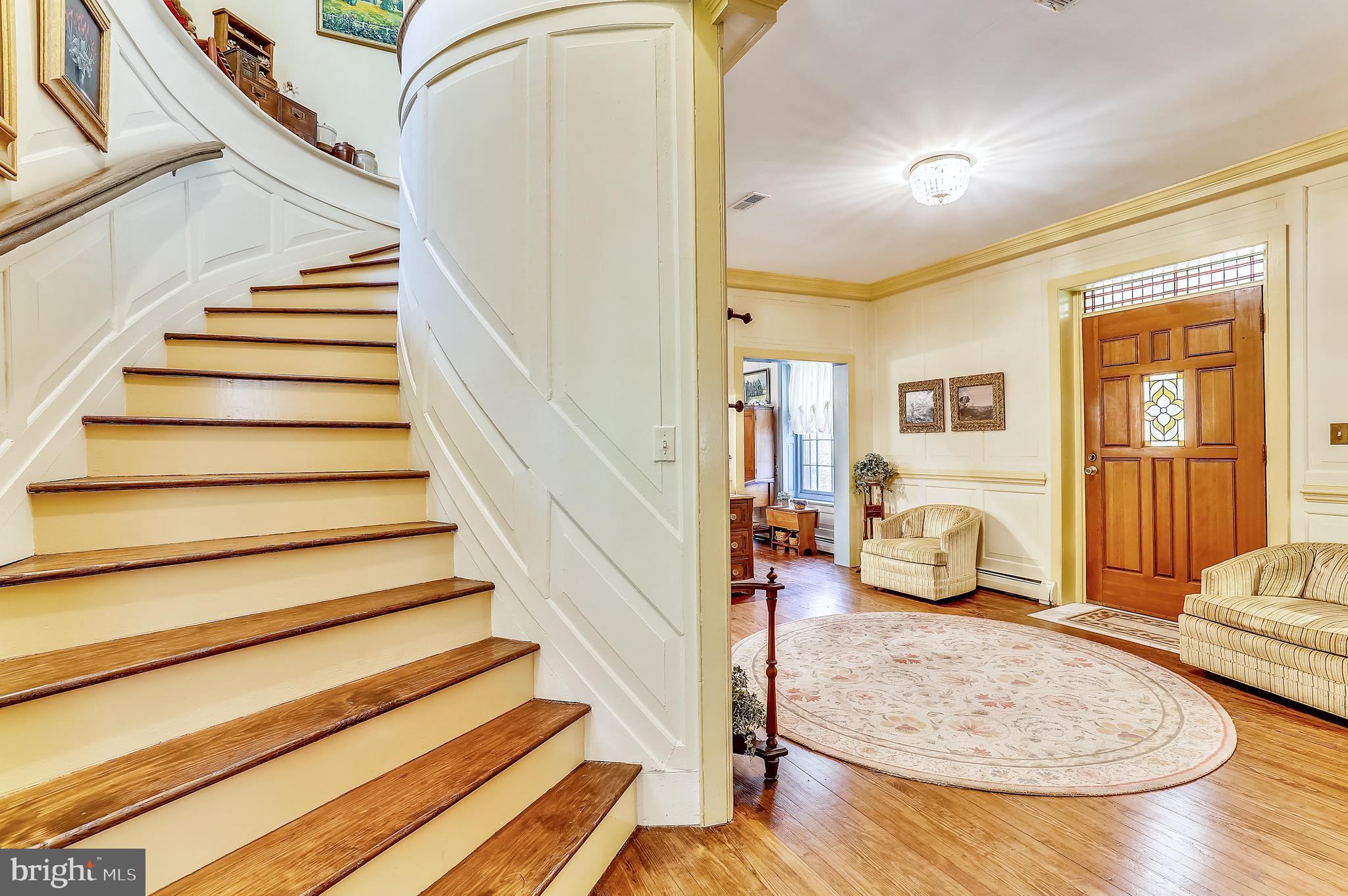 1895 German Chapel Road Prince Frederick, MD 20678 - Photo 18 of 90 Beautiful curved stairway! Note paneling on walls!