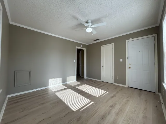 a view of a backyard of the house