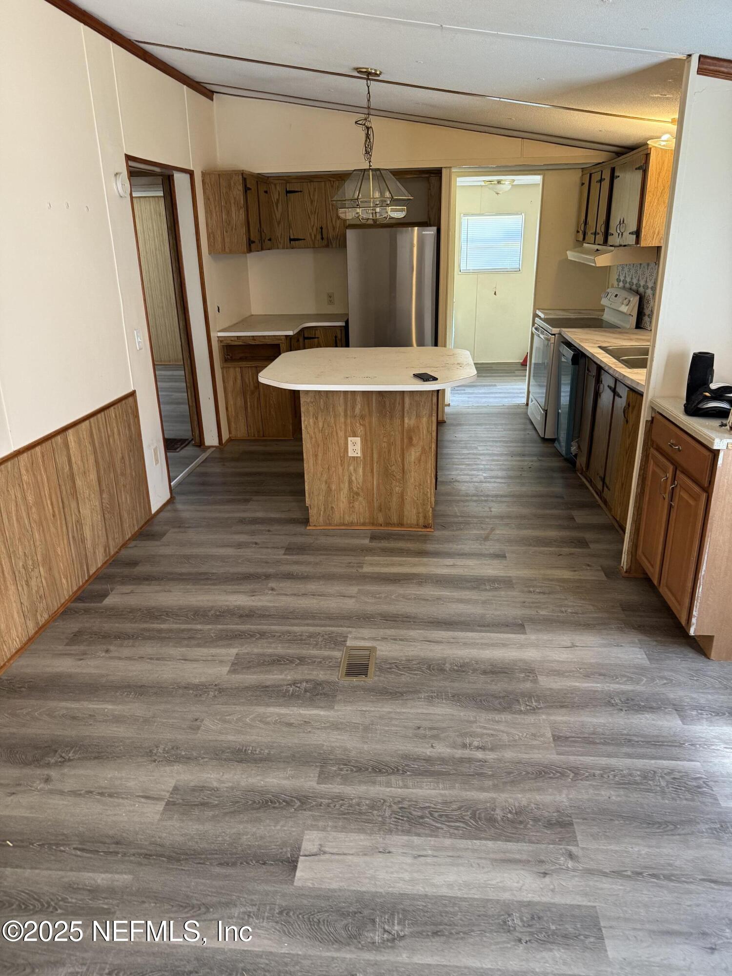 3255 County Road 208 St. Augustine, FL 32092 - Photo 10 of 22 a view of a kitchen from the hallway