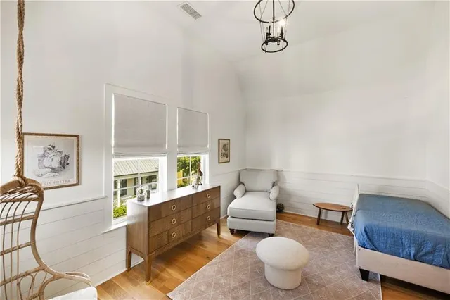 a living room with furniture and a table