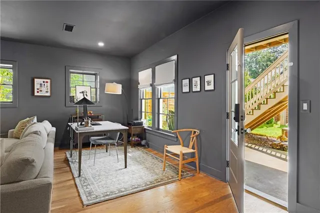 a living room with furniture and a window