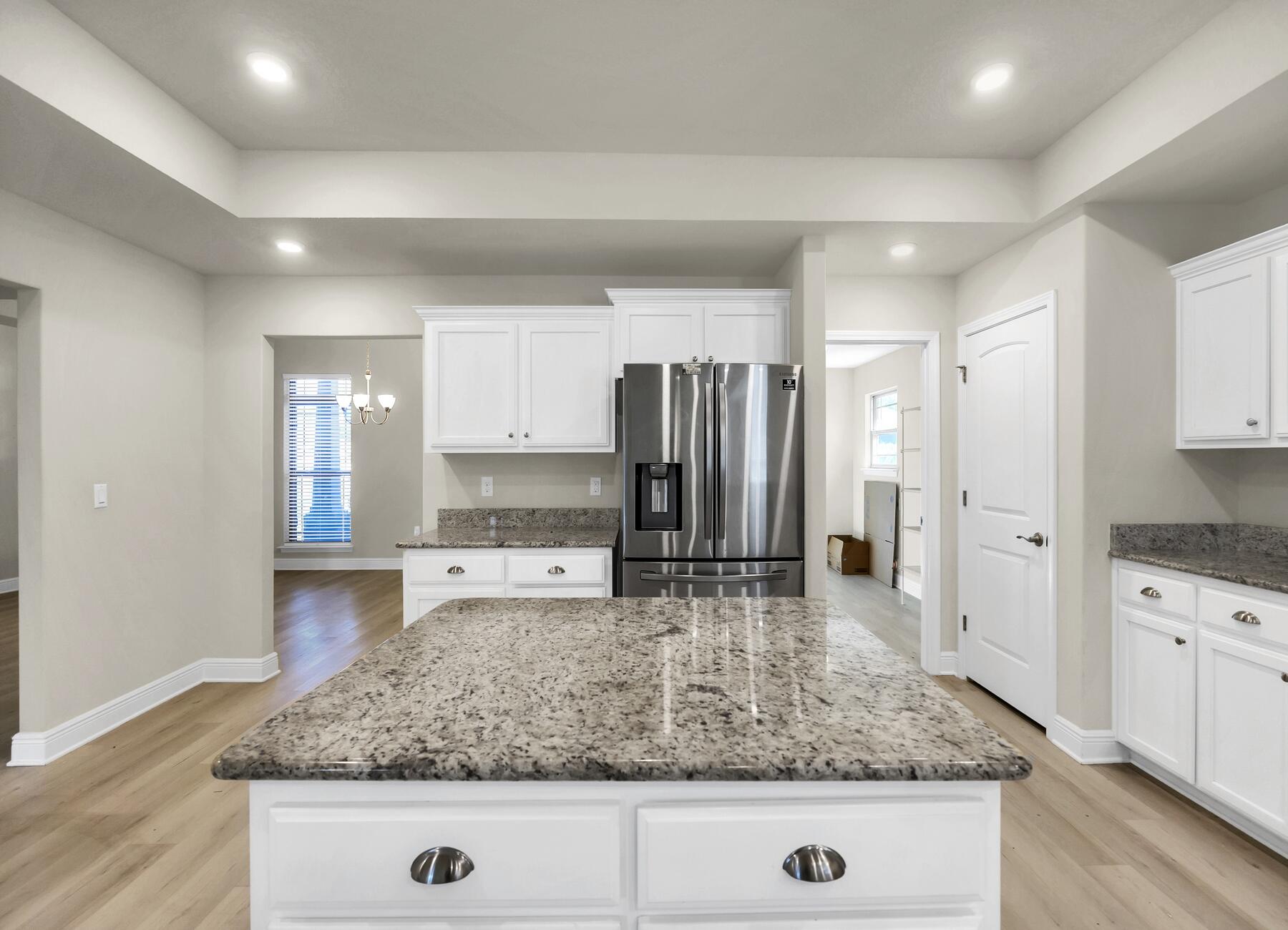 3639 Ranch Drive Crestview, FL 32539 - Photo 25 of 84 a kitchen with stainless steel appliances granite countertop a sink stove and refrigerator
