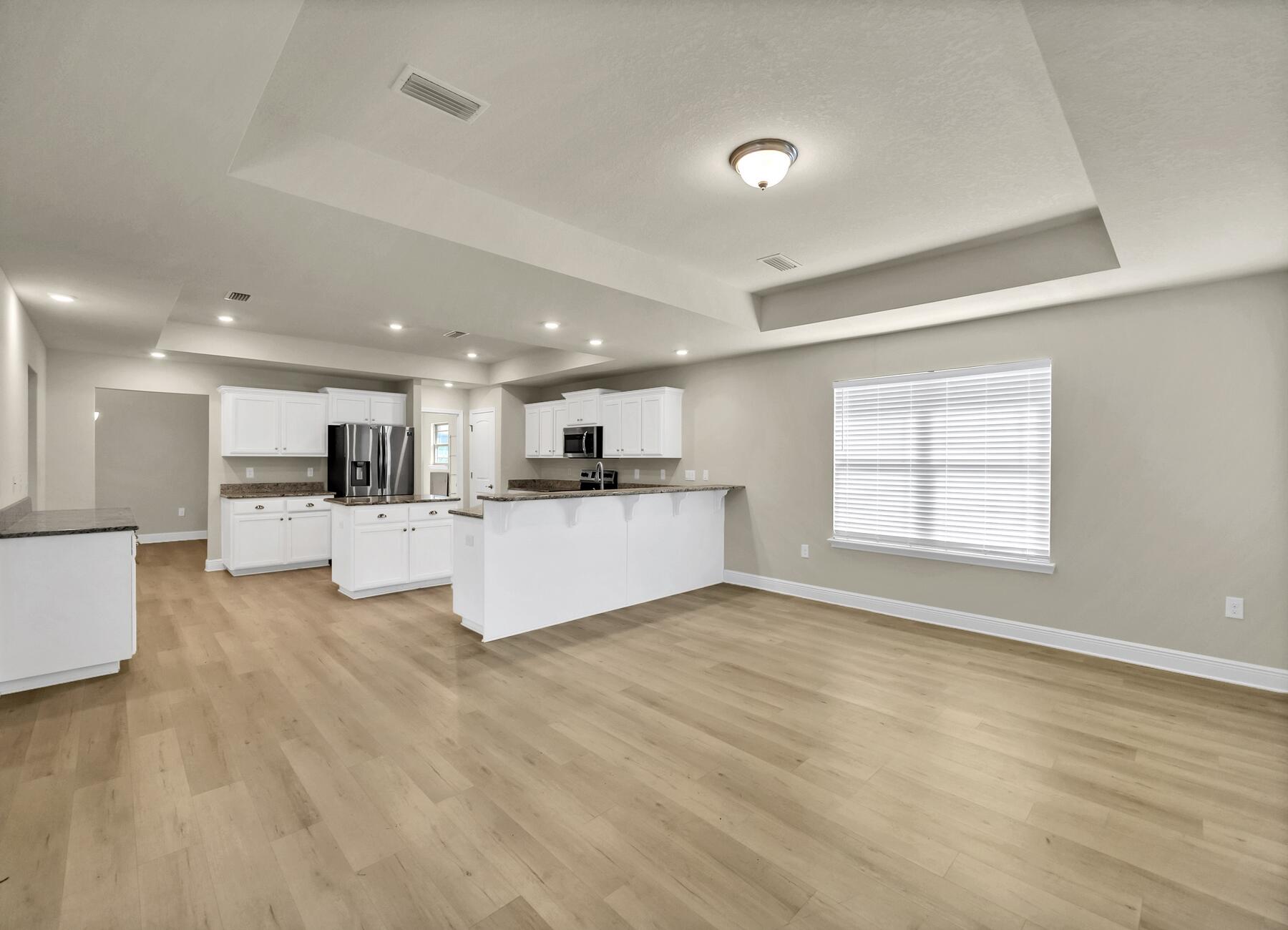 3639 Ranch Drive Crestview, FL 32539 - Photo 35 of 84 a view of kitchen with kitchen island and stainless steel appliances