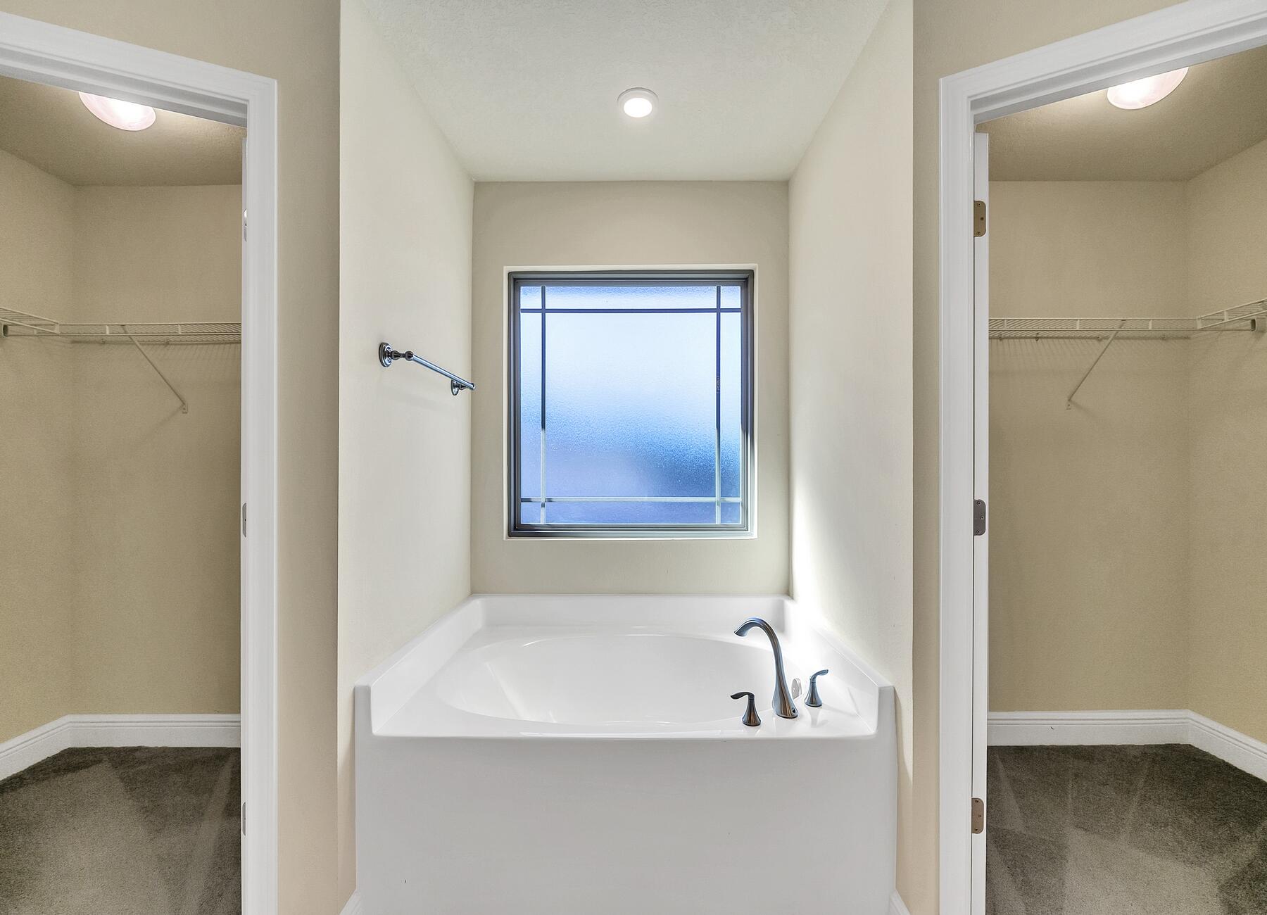 3639 Ranch Drive Crestview, FL 32539 - Photo 76 of 84 a bathroom with a bathtub and a shower