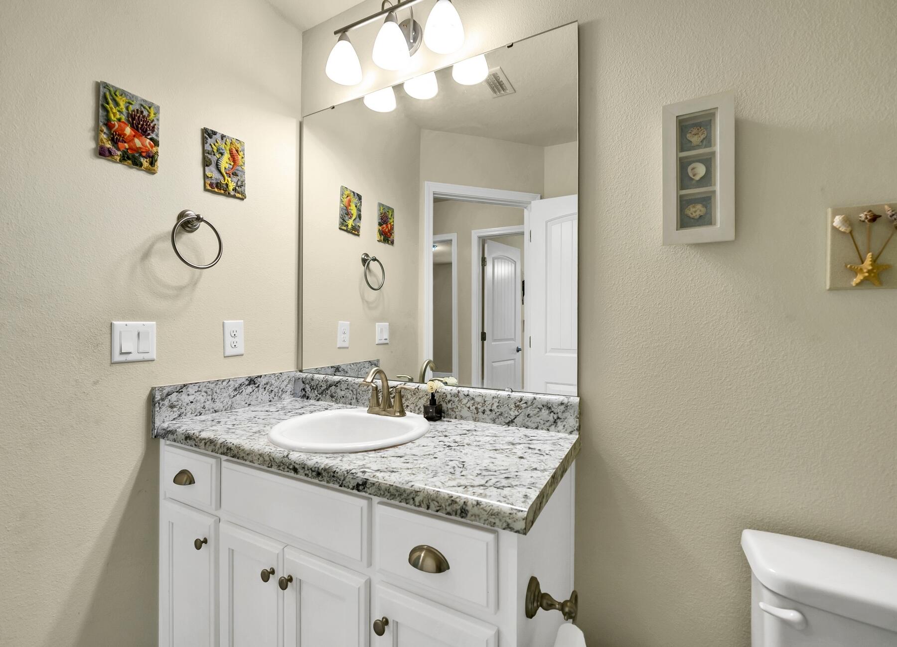 3639 Ranch Drive Crestview, FL 32539 - Photo 80 of 84 a bathroom with a granite countertop sink a large mirror and shower