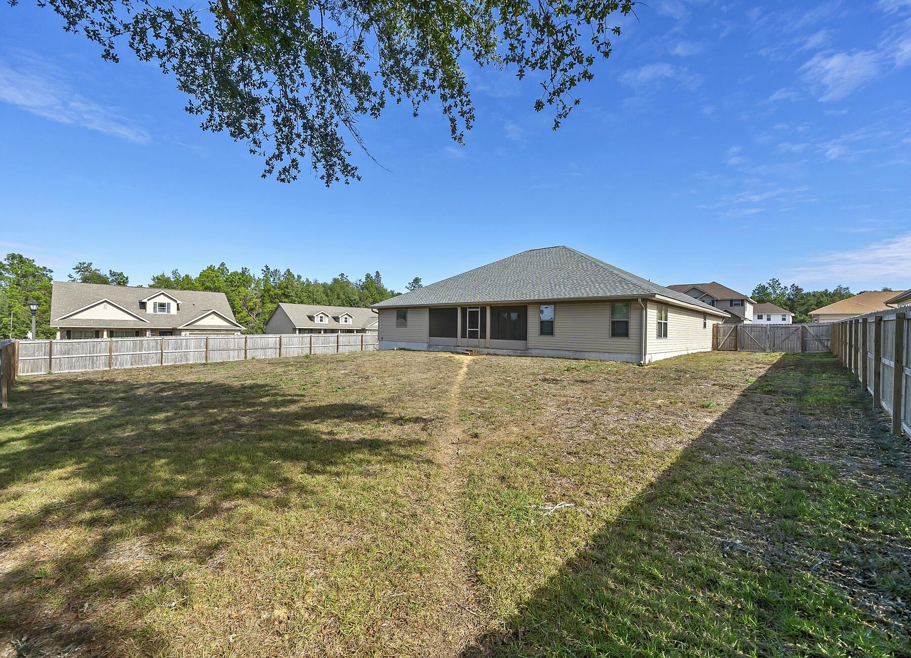 3639 Ranch Drive Crestview, FL 32539 - Photo 84 of 84 a front view of a house with a yard