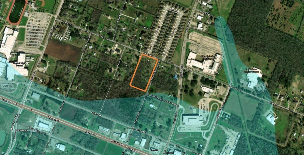 7142 Lewis Lane Manvel, TX 77578 - Photo 5 of 5 an aerial view of residential houses with outdoor space and trees