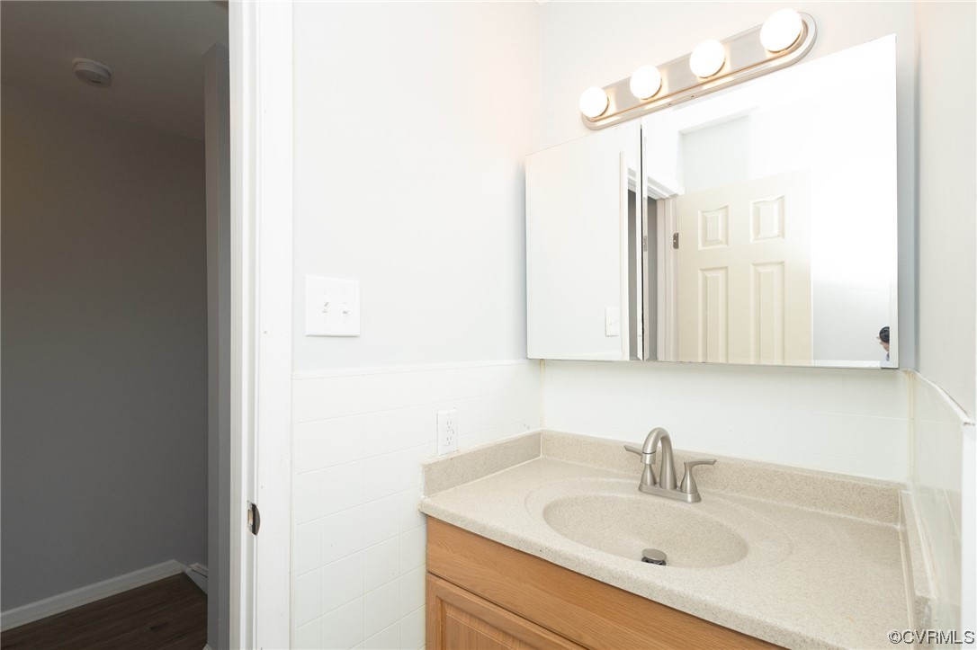 6225 Barrister Road Chesterfield, VA 23832 - Photo 17 of 31 a bathroom with a sink and a mirror