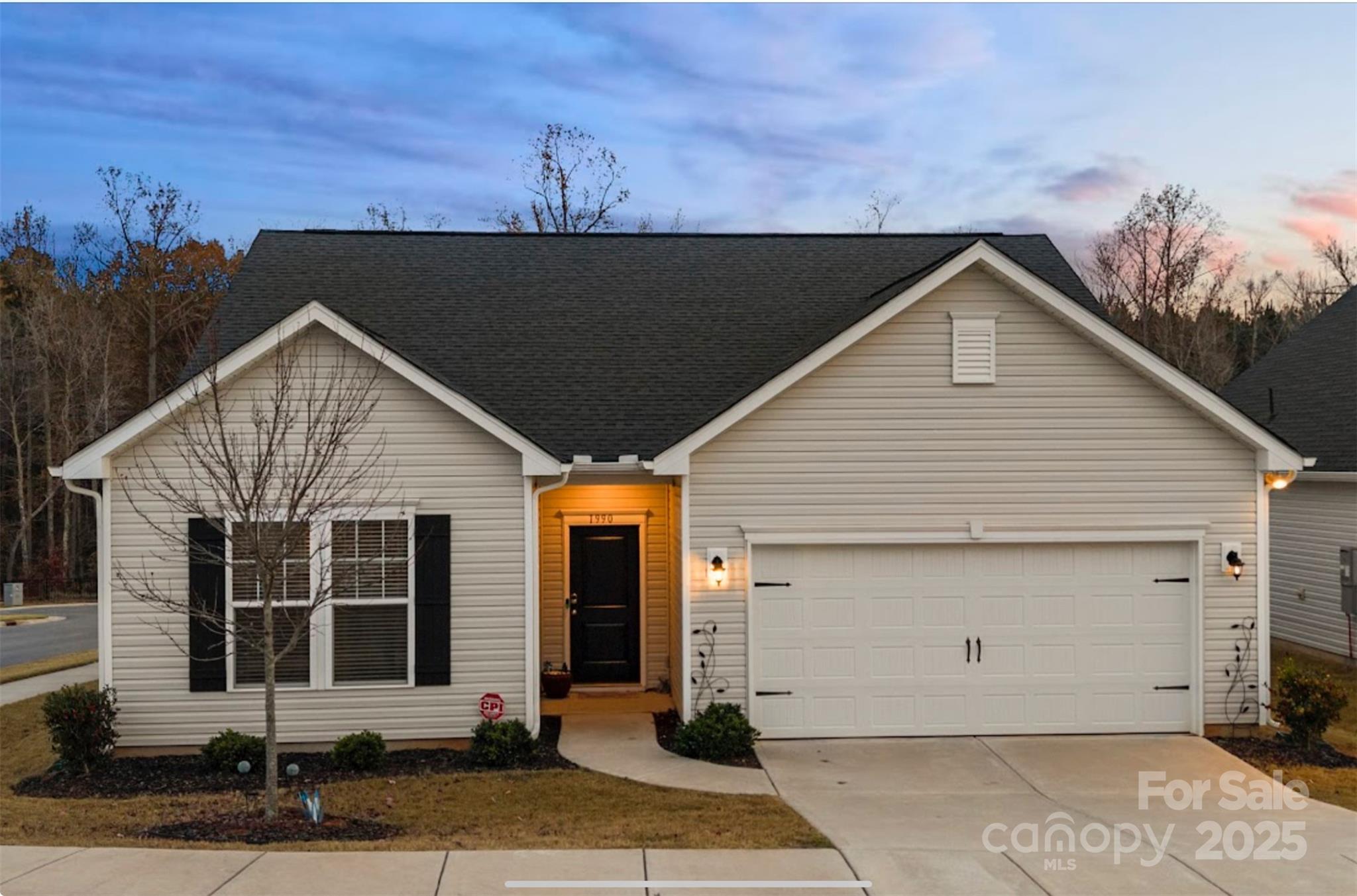 a view of a house with garage