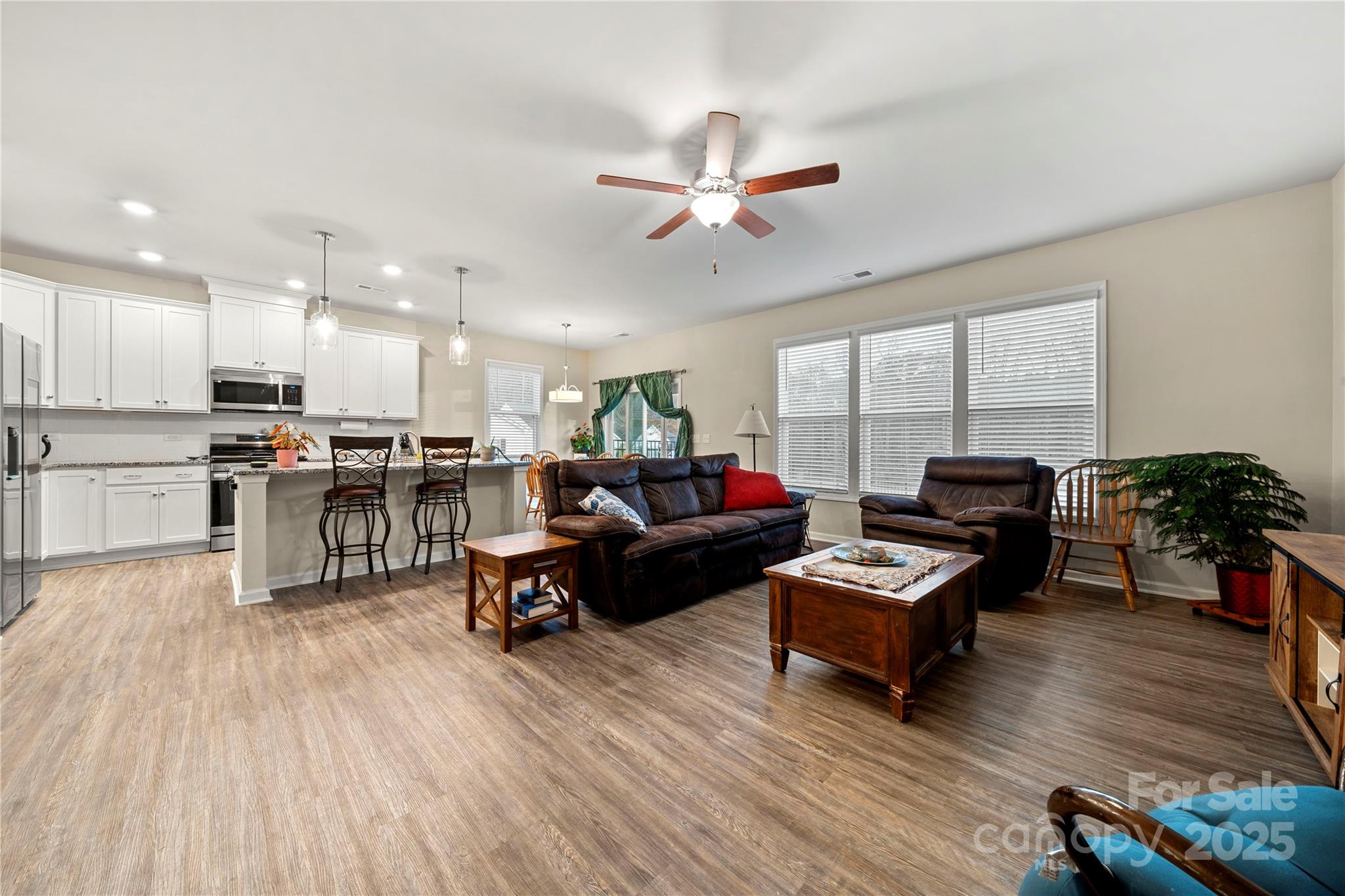 1990 Ambrose Way Denver, NC 28037 - Photo 11 of 40 a living room with furniture and kitchen view