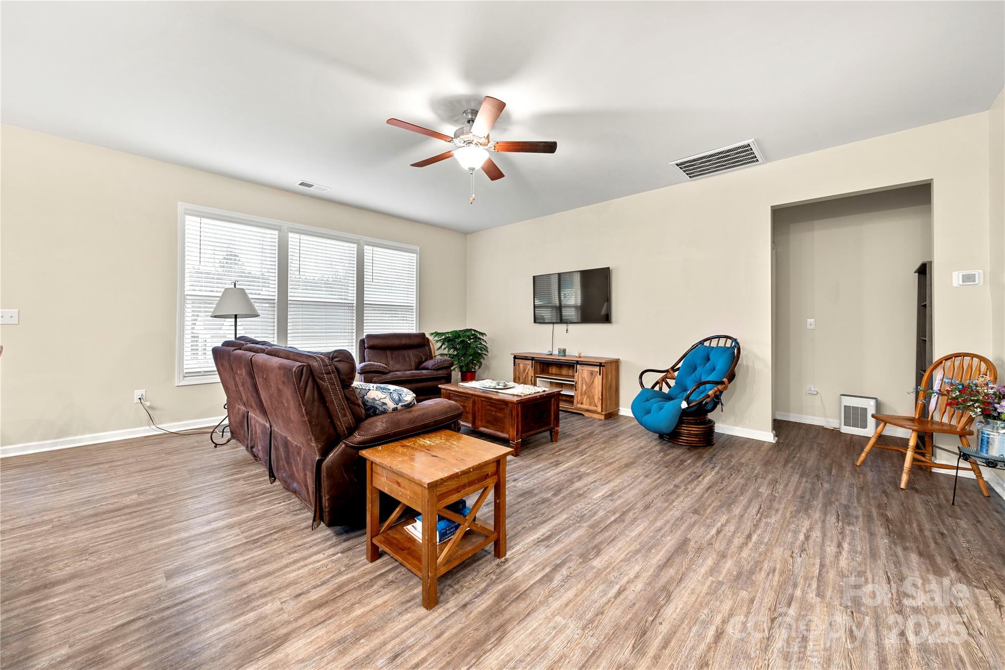1990 Ambrose Way Denver, NC 28037 - Photo 13 of 40 a living room with furniture and a wooden floor