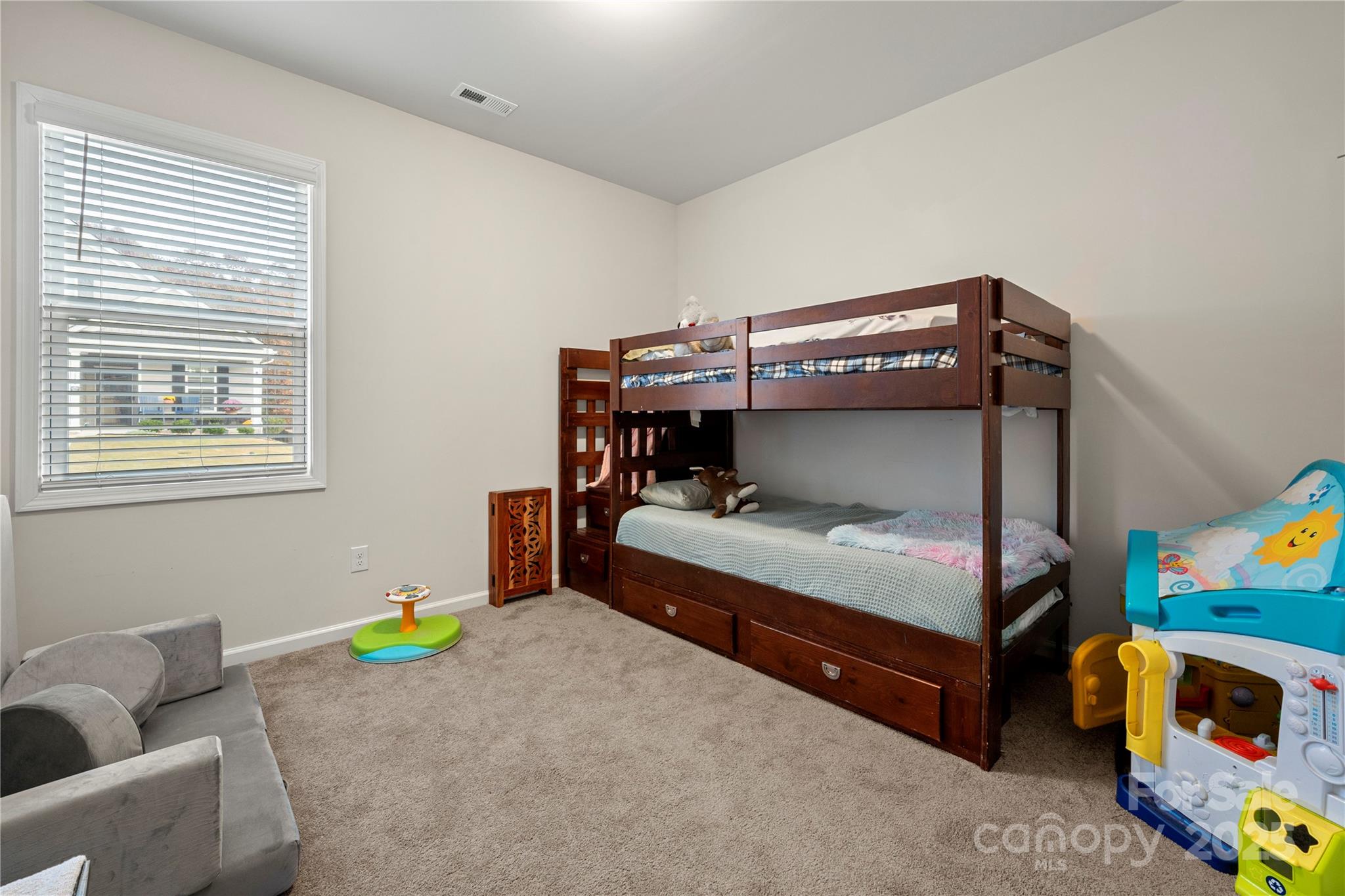 1990 Ambrose Way Denver, NC 28037 - Photo 22 of 40 a bedroom with a bed and a window