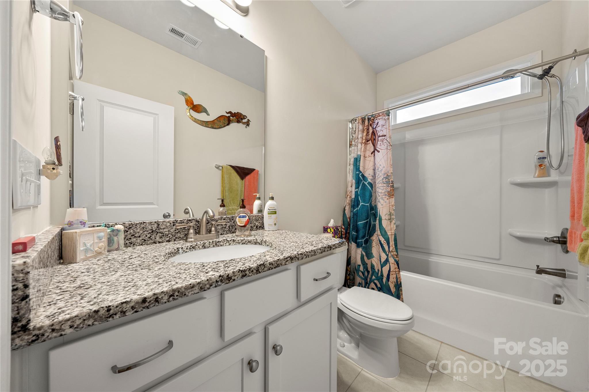1990 Ambrose Way Denver, NC 28037 - Photo 23 of 40 a bathroom with a granite countertop sink toilet and shower