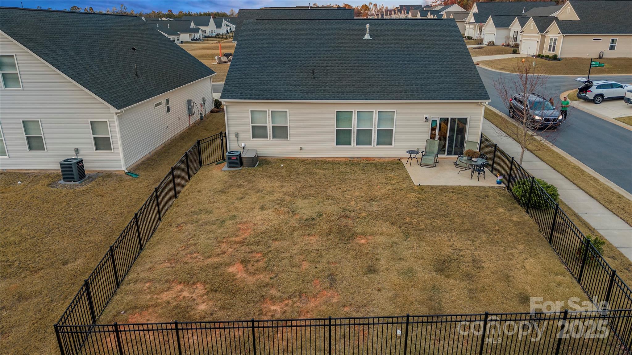 1990 Ambrose Way Denver, NC 28037 - Photo 28 of 40 a view of a house with wooden fence