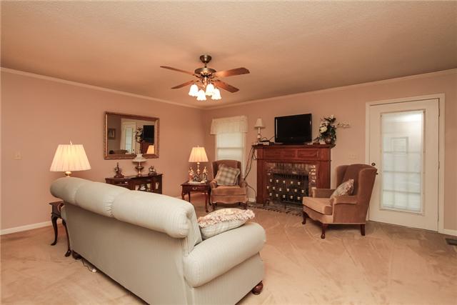 5211 Stacy Springs Road Springfield, TN 37172 - Photo 6 of 20 EXPANSIVE GATHERING ROOM WITH GREAT VIEW FROM WINDOWS AND GAS FIREPLACE