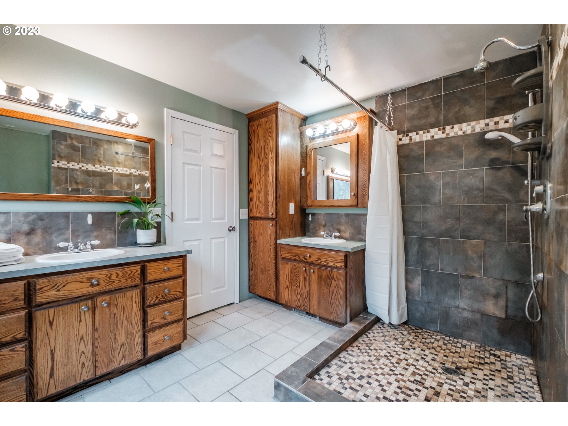 30115 Berlin Road Lebanon, OR 97355 - Photo 20 of 48 a bathroom with a sink a double vanity and a mirror