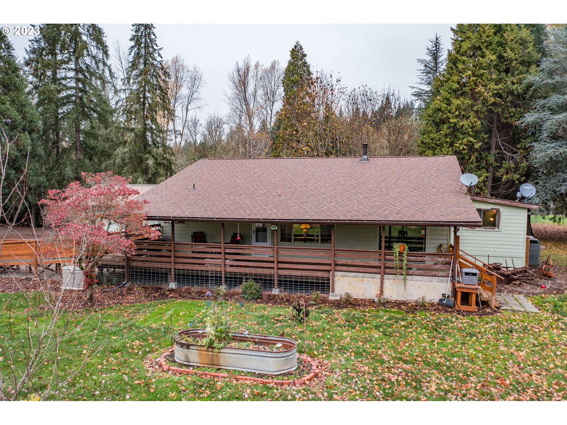 30115 Berlin Road Lebanon, OR 97355 - Photo 26 of 48 a backyard of a house with barbeque oven