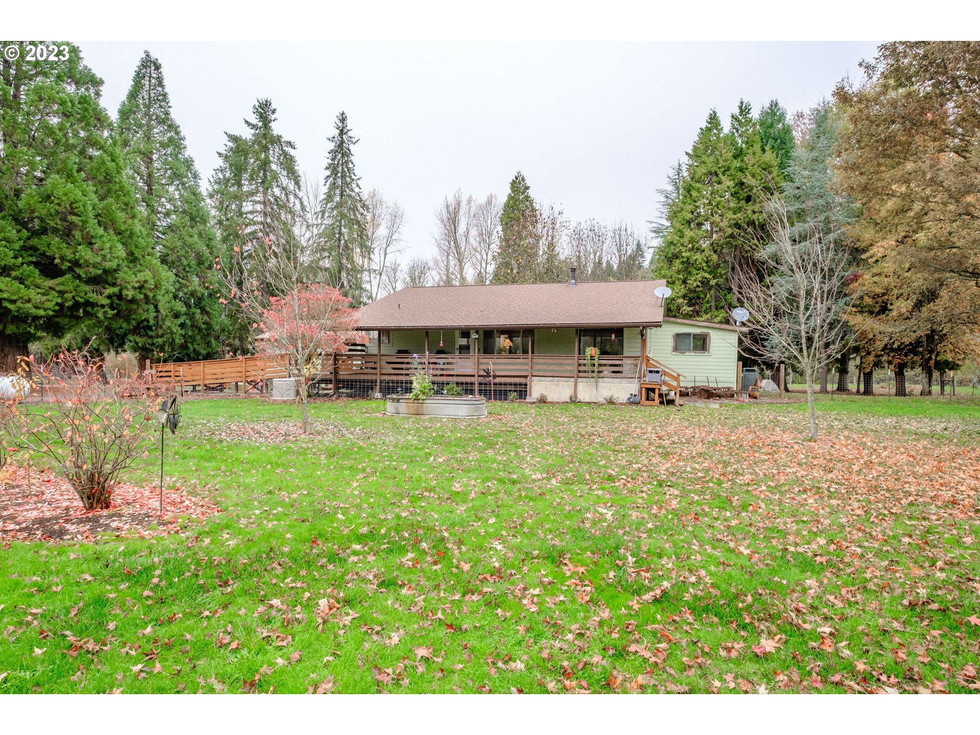 30115 Berlin Road Lebanon, OR 97355 - Photo 39 of 48 a view of a house with a yard