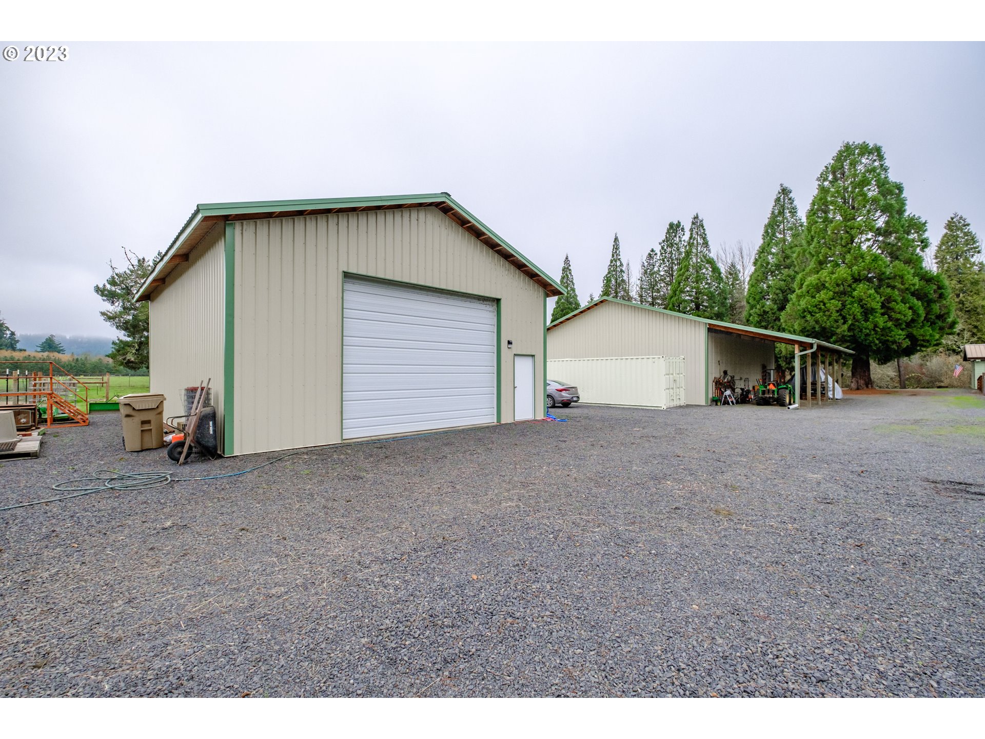 30115 Berlin Road Lebanon, OR 97355 - Photo 43 of 48 a view of house with backyard and bushes