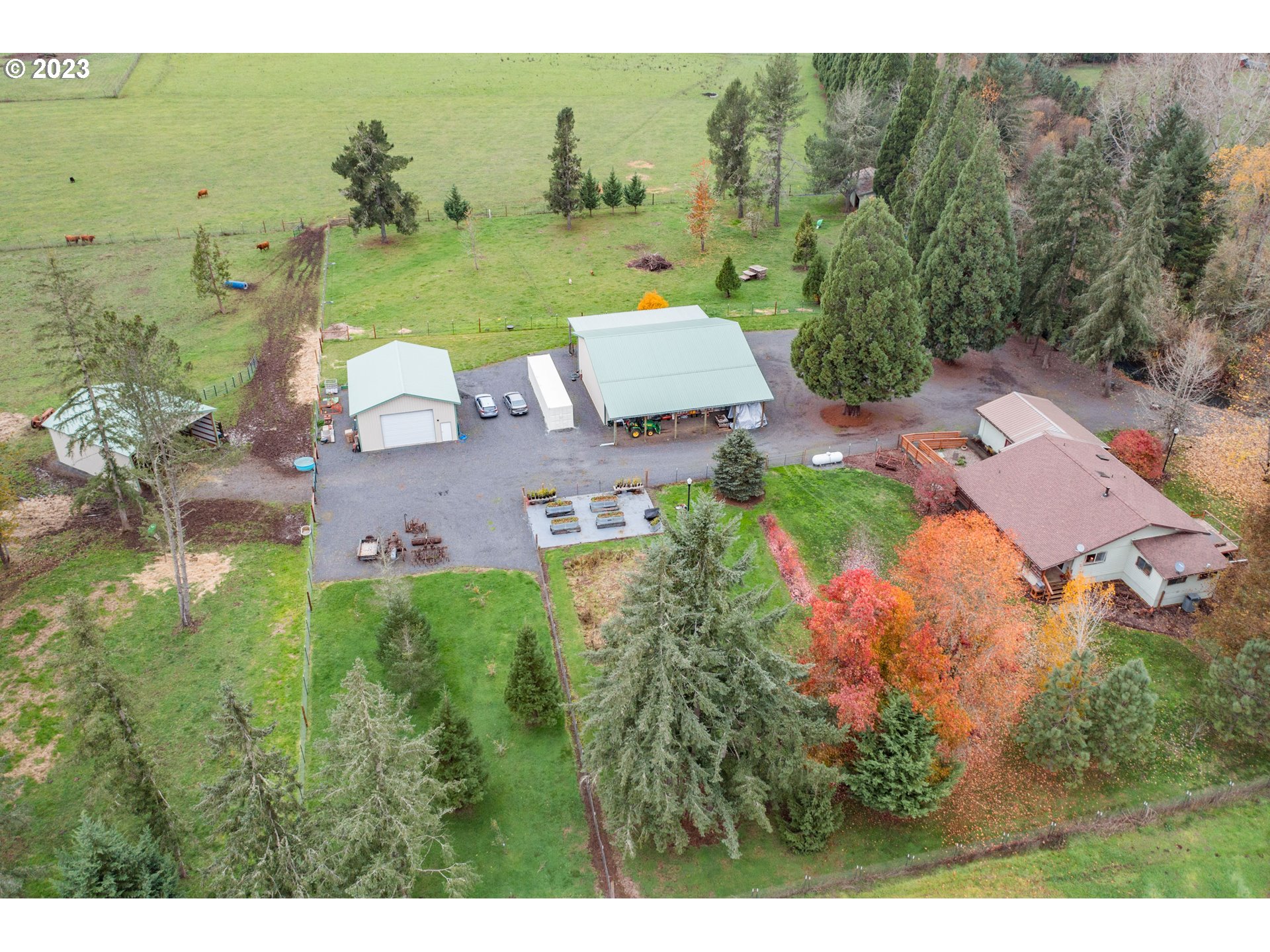 30115 Berlin Road Lebanon, OR 97355 - Photo 47 of 48 an aerial view of a house with a yard