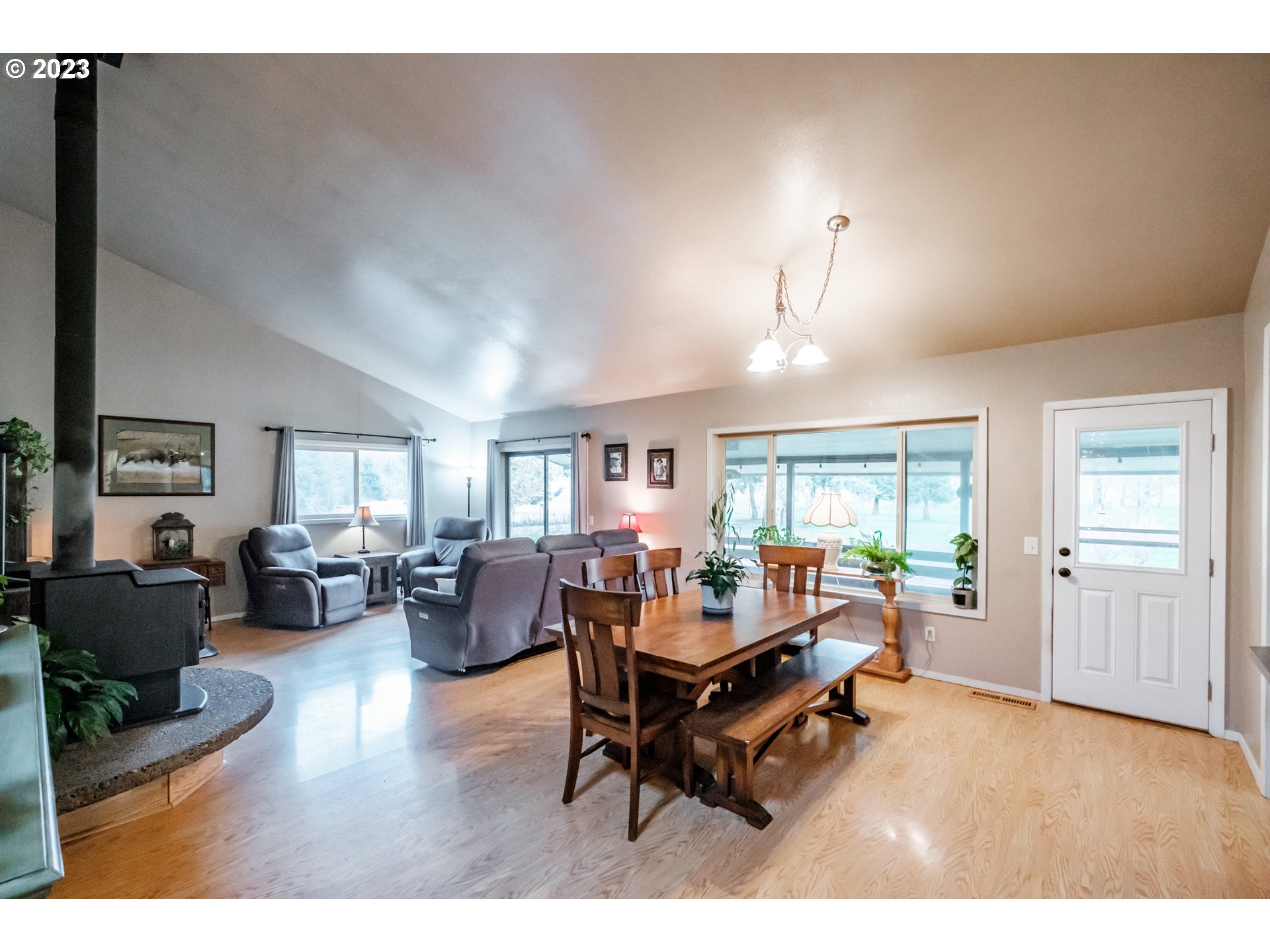 30115 Berlin Road Lebanon, OR 97355 - Photo 6 of 48 a living room with furniture and a wooden floor