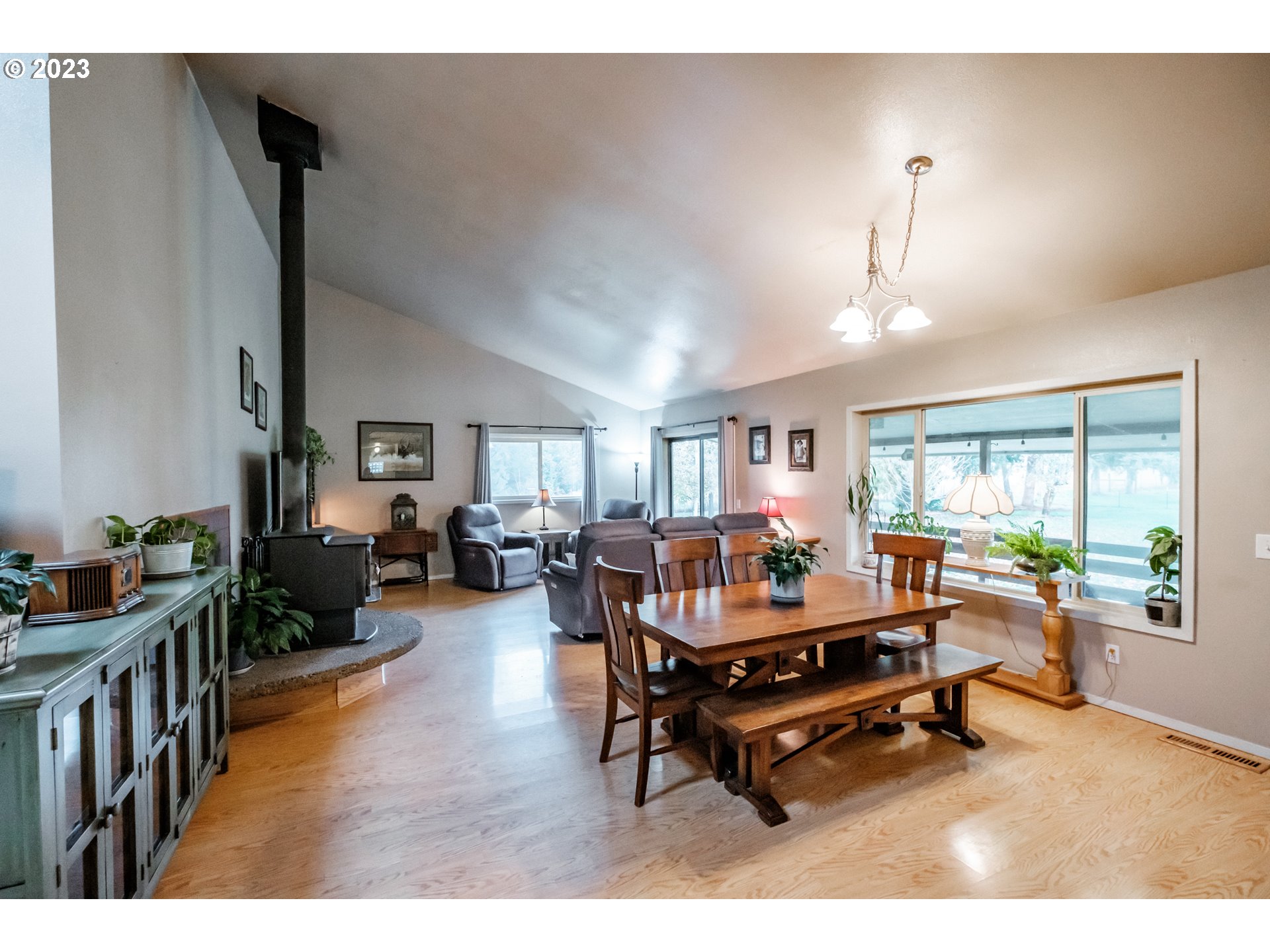 30115 Berlin Road Lebanon, OR 97355 - Photo 7 of 48 a living room with furniture a window and a table