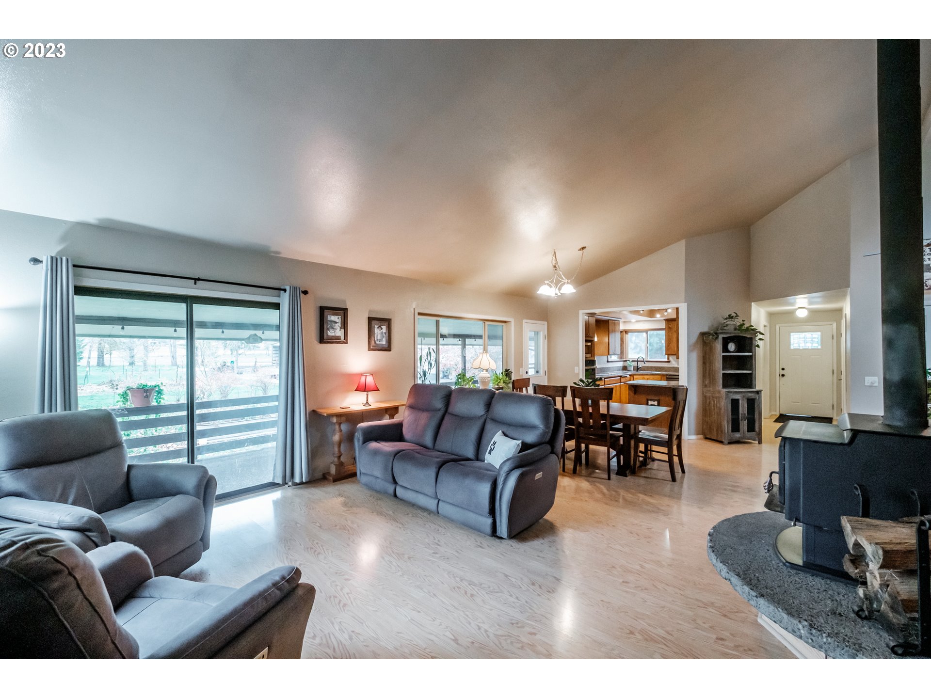 30115 Berlin Road Lebanon, OR 97355 - Photo 8 of 48 a living room with furniture and a large window