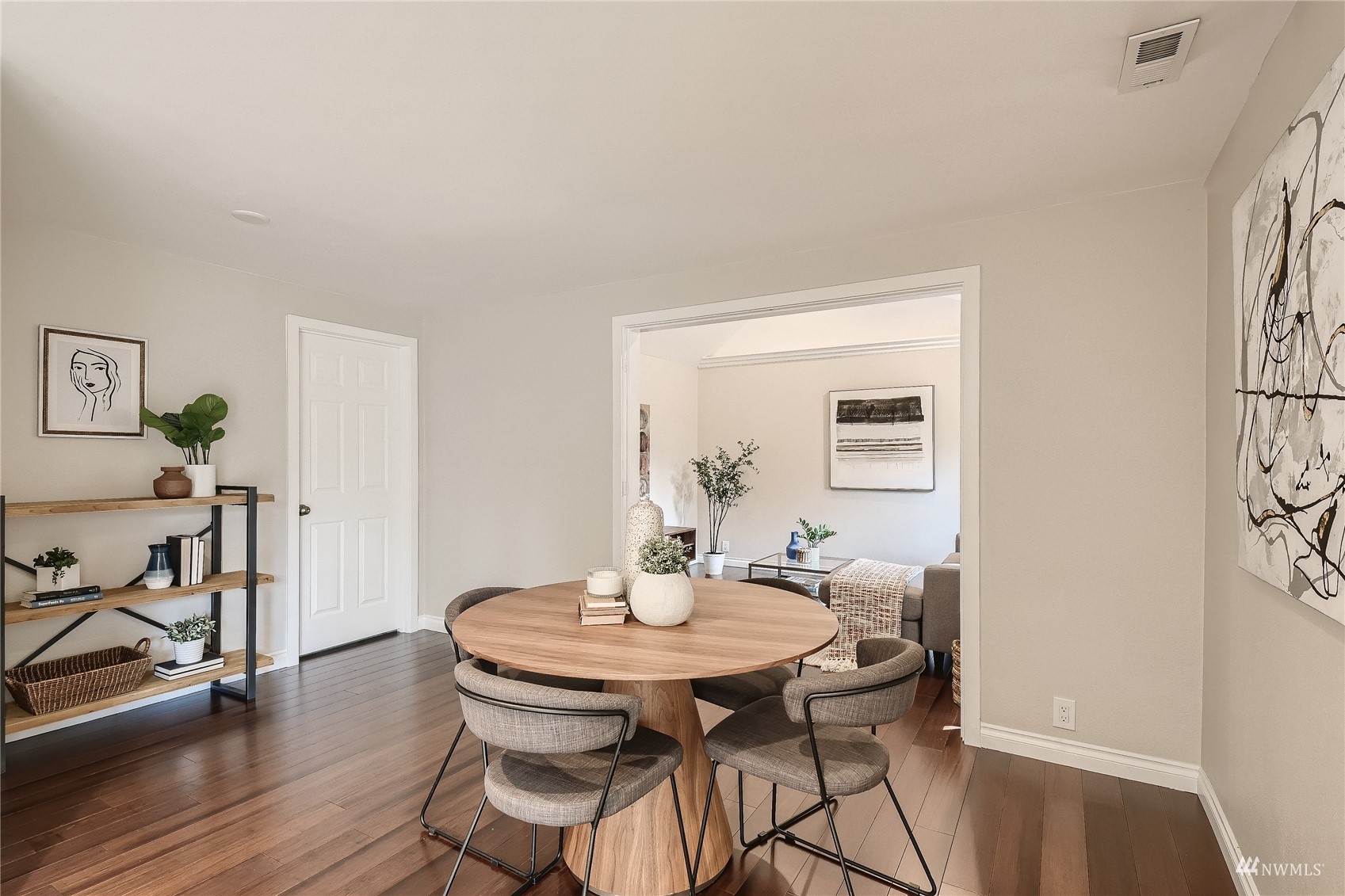 314 213th Place Southwest Bothell, WA 98021 - Photo 7 of 29 a view of a dining room with furniture and wooden floor
