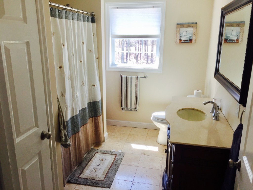 19 Baker Road Salisbury, MA 01952 - Photo 12 of 12 a bathroom with a sink a toilet and shower