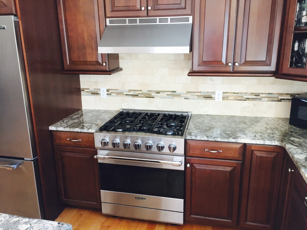 19 Baker Road Salisbury, MA 01952 - Photo 7 of 12 a kitchen with stainless steel appliances granite countertop a stove and a cabinets