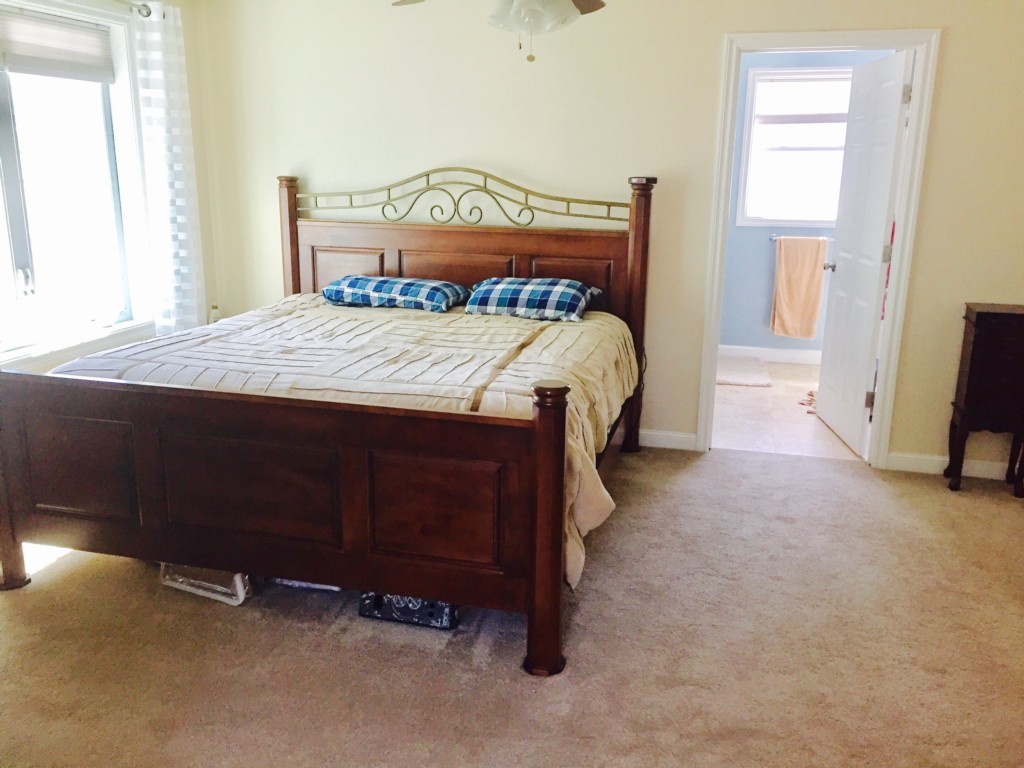 19 Baker Road Salisbury, MA 01952 - Photo 9 of 12 a bedroom with a bed and a window