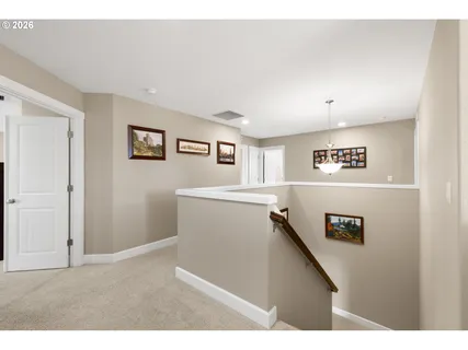 a view of a hallway with workspace