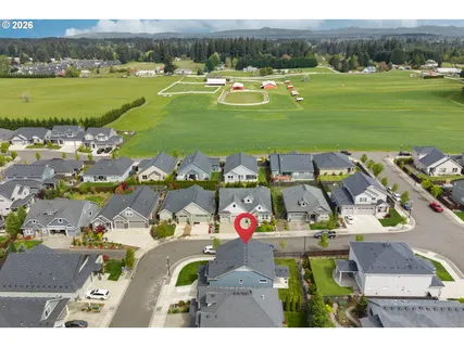 a view of a house with a big yard