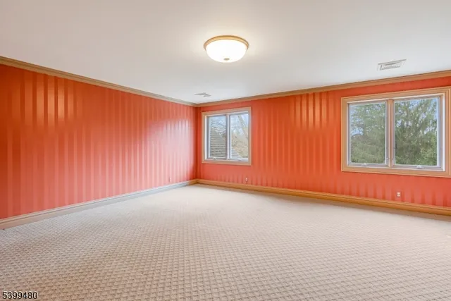 a view of a room with large window