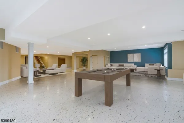 a view of a living room and dining room