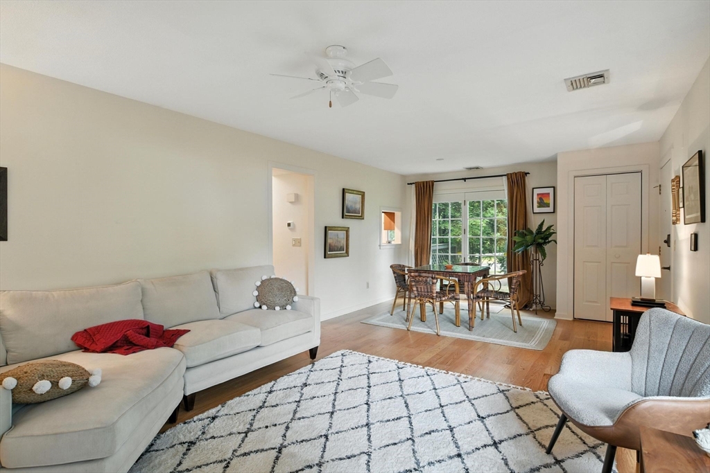 5 Amity Place, Unit 5 Amherst, MA 01002 - Photo 6 of 39 a living room with furniture and wooden floor