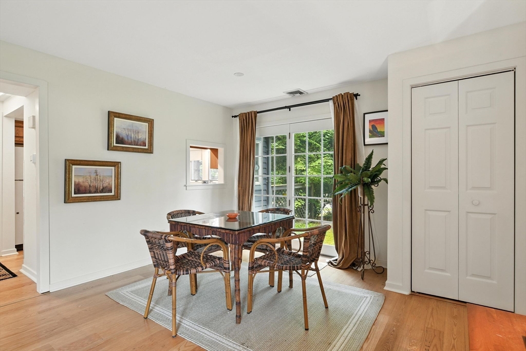 5 Amity Place, Unit 5 Amherst, MA 01002 - Photo 8 of 39 a view of a dining room with furniture and wooden floor