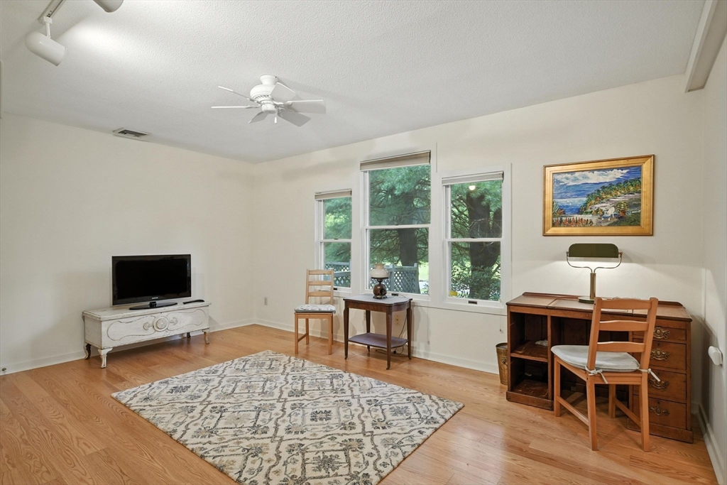 5 Amity Place, Unit 5 Amherst, MA 01002 - Photo 10 of 39 a view of a dining room with furniture window and wooden floor