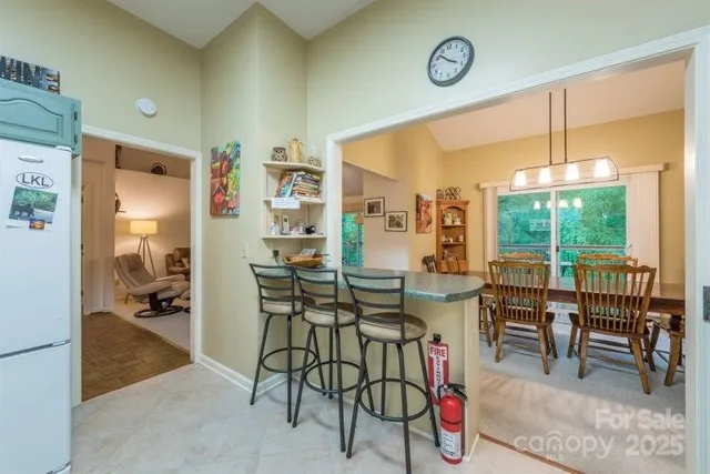a view of a livingroom with furniture window and outside view