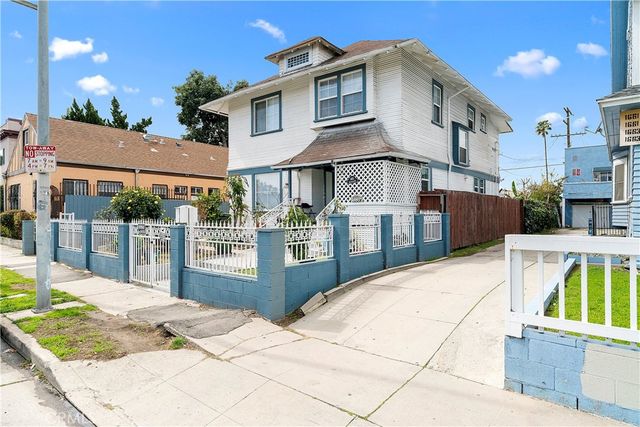 a view of a house with a swimming pool