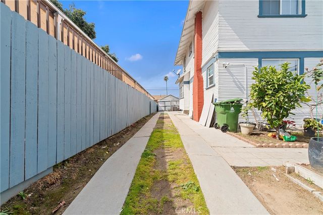 a spacious bathroom with a sink and mirror