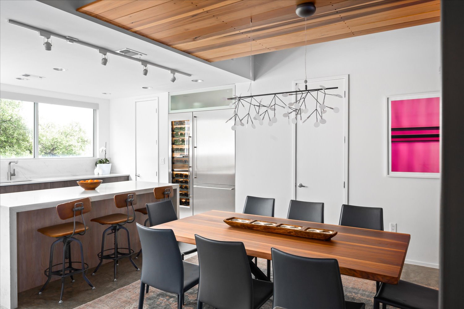 2301 South 5th Street, Unit 11 Austin, TX 78704 - Photo 11 of 24 Open sightlines to the kitchen and living area create an effortless flow for hosting.