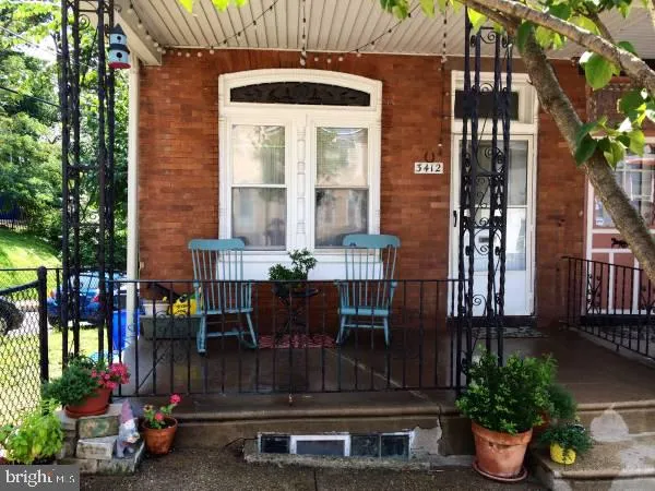 a front view of a house with patio