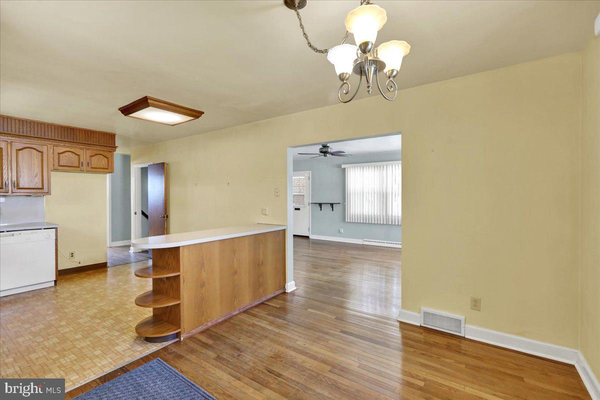 629 Lawrence Avenue Reading, PA 19609 - Photo 9 of 39 a view of a room with wooden floor and staircase