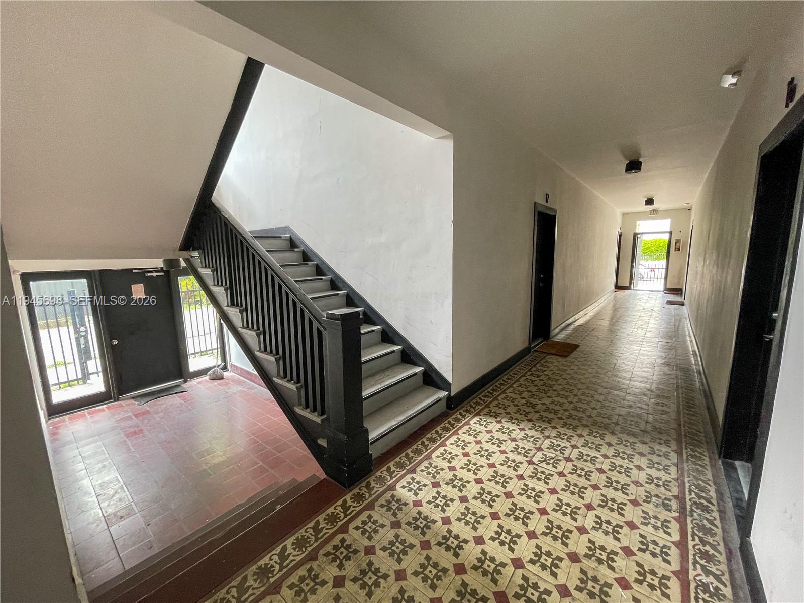 36 Northeast 65th Street Miami, FL 33138 - Photo 3 of 6 a view of a hallway view with staircase